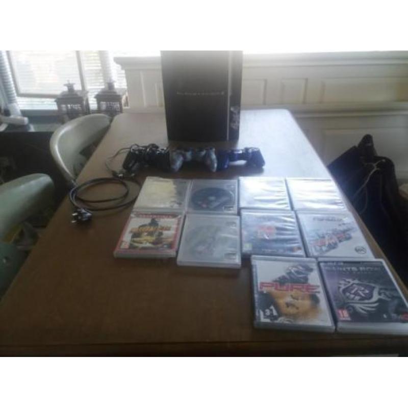 PlayStation 3 met 9 spellen en 3 controllers