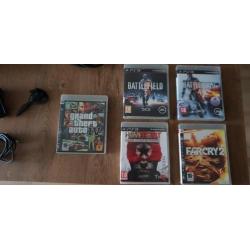 Playstation 3 + controller + headset + 9 spellen